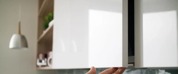 Handleless cabinetry using recessed groove handles for a sleek minimalist look.