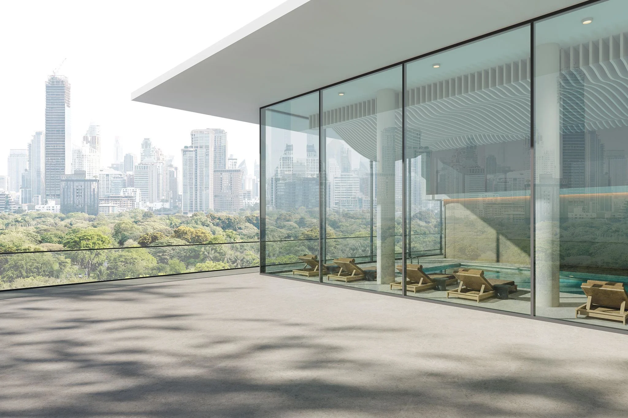 Modern steel parapet wall design on a rooftop terrace featuring glass panels, perforated steel screens, and contemporary architectural detailing.